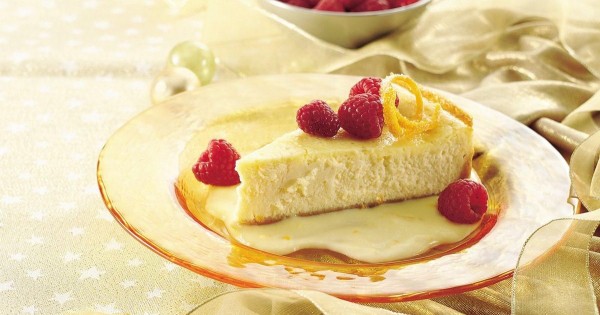 Luscious Orange Cheesecake with Raspberries