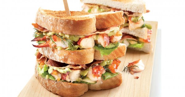 Lobster club sandwich with sweet lime mayonnaise and avocado