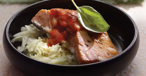 Salmon pavé on crispy cabbage